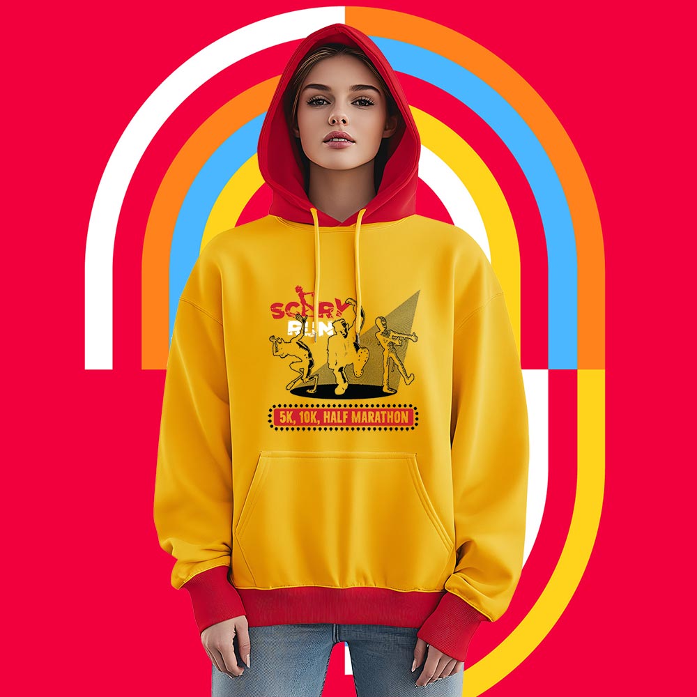 Bright yellow hoodie with red accents worn by a model in a casua